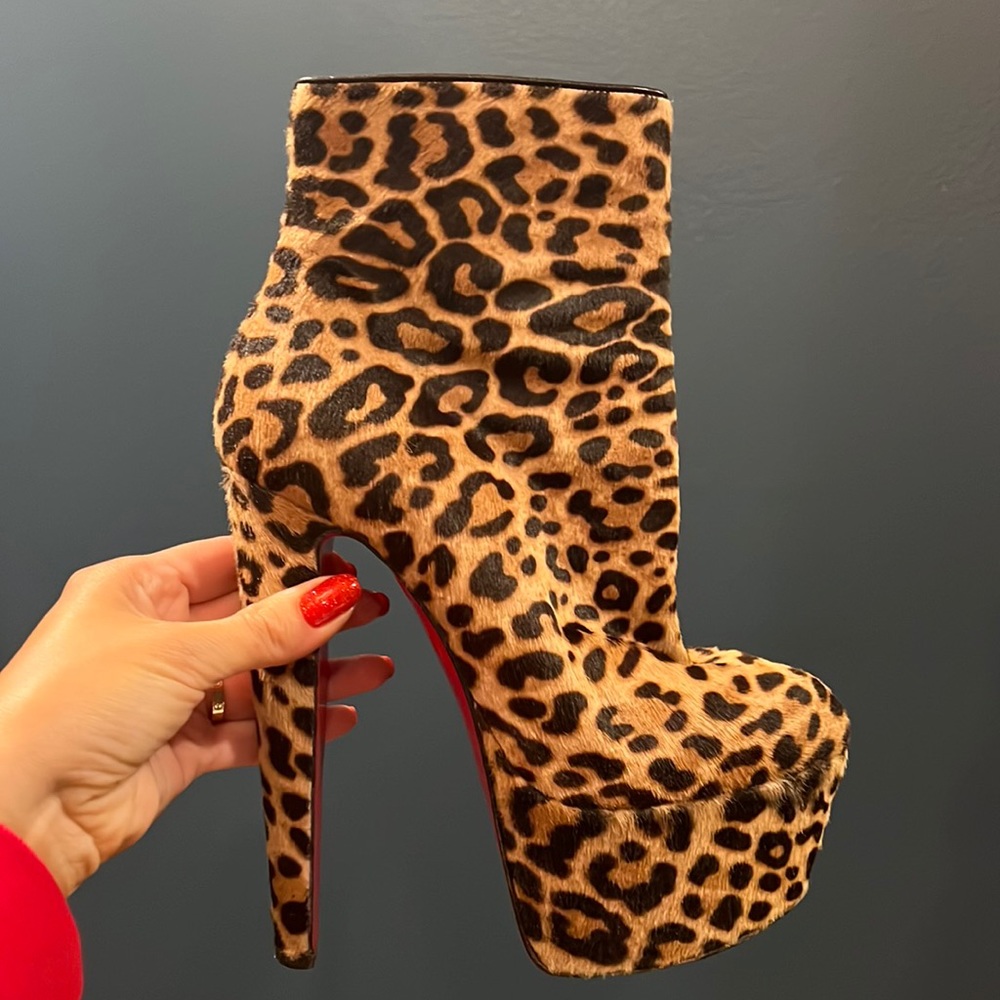 Christian Louboutin
Pony-style calfskin ankle boots